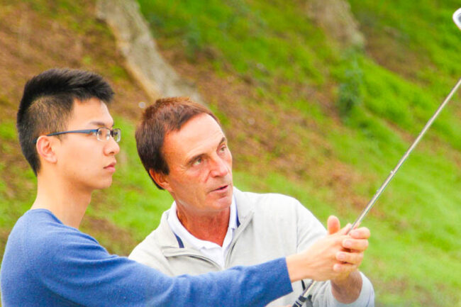 Golf lesson reviews Mike Wydra helping the student